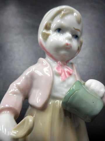 Vintage Porcelain Mad Girl Figure 5 1/4" Signed G. A. 617 with Crown Stamp, Child holding a Cup and Spoon, Pink Jacket, Hat Cap